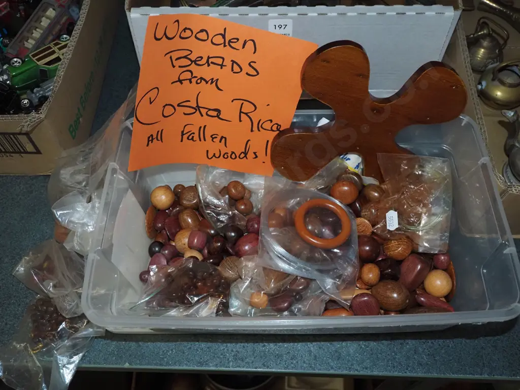 plastic tub of wooden beads from trees in Costa Rica Image 1++