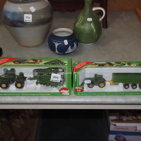 pair of boxed diecast scale tractor models
