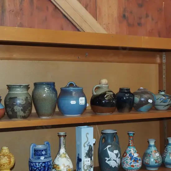 shelf; pottery jugs and vases