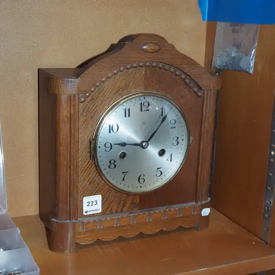 wood cased mantle clock