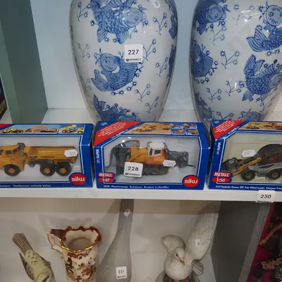 3x boxed diecast construction vehicles