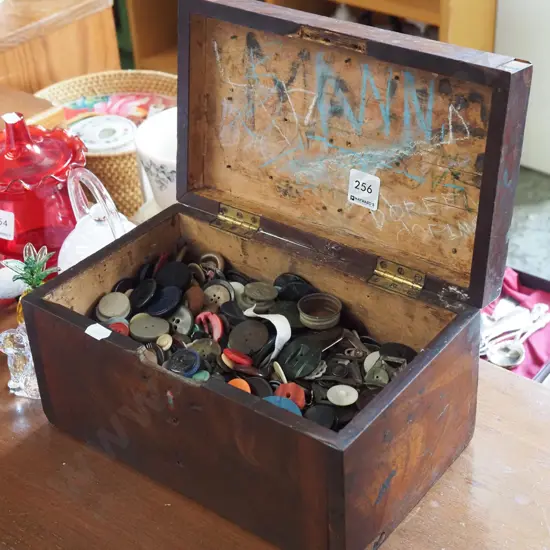 box of various buttons