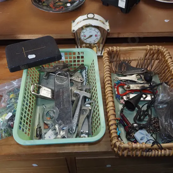 plastic basket, cane basket; bottle openers, marbles, kangaroo figurine, bibles, mantle clock etc