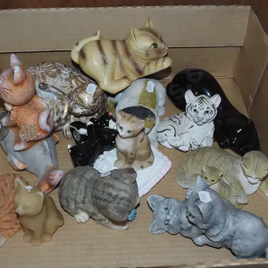 box of cat figurines