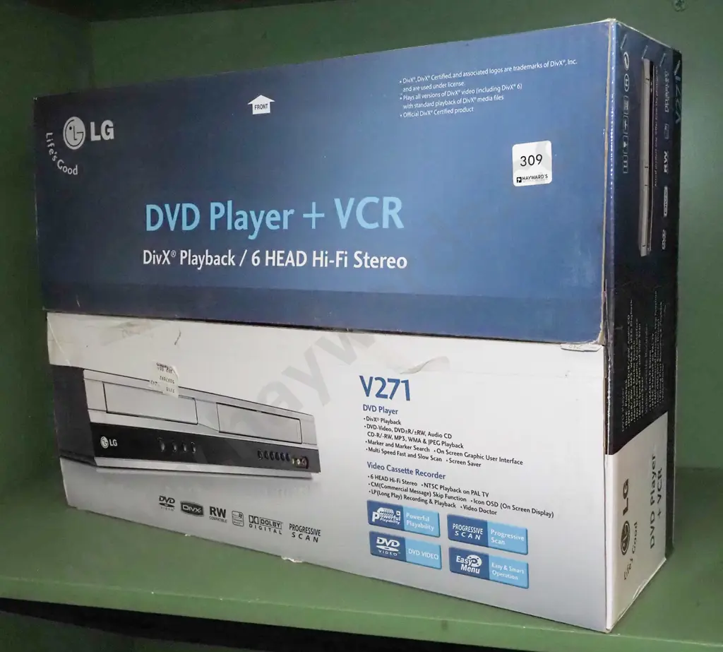 boxed as new LG DVD and VCR player Image 1++