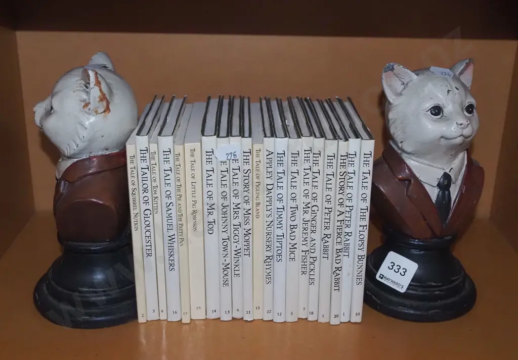 2x composite cat book ends, Beatrix Potter books Image 1++