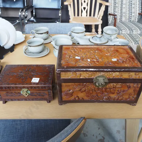 2x small wooden carved chests Largest H170
