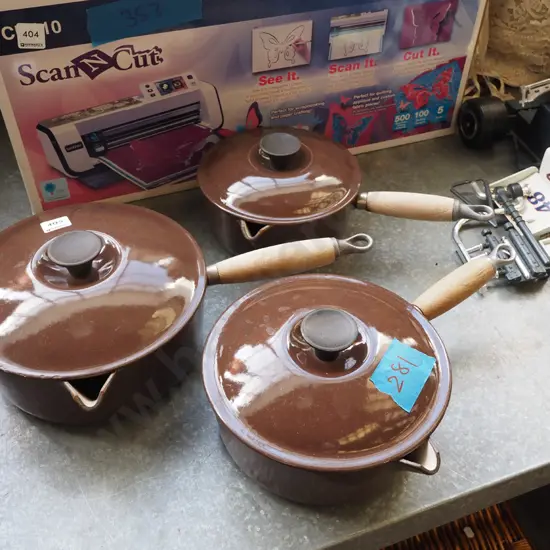 set of 3 cast iron and enamel pouring pots