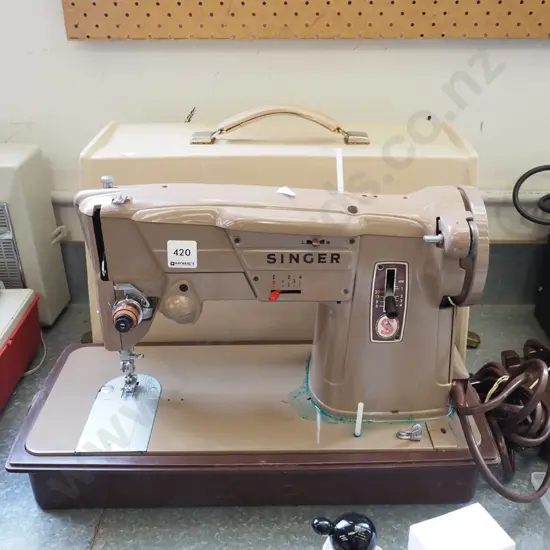 Singer table top sewing machine - leaking oil