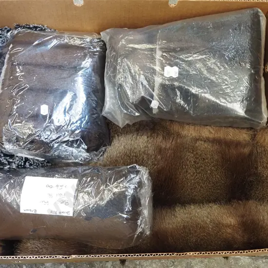 box of faux fur pieces