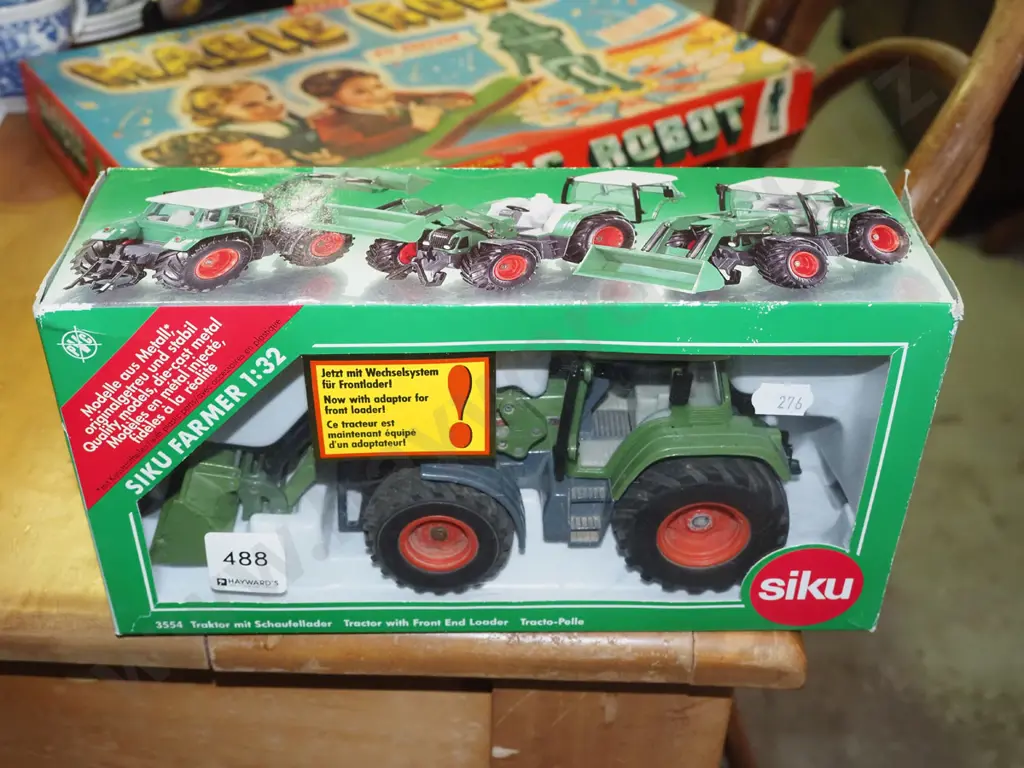 boxed diecast model of tractor with front end loader Image 1++