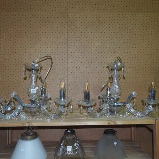 pair of matching chrome plastic and glass 3 bulb chandeliers H300