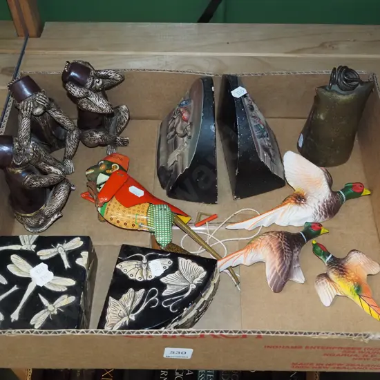 box; monkey figurines, cow bell etc