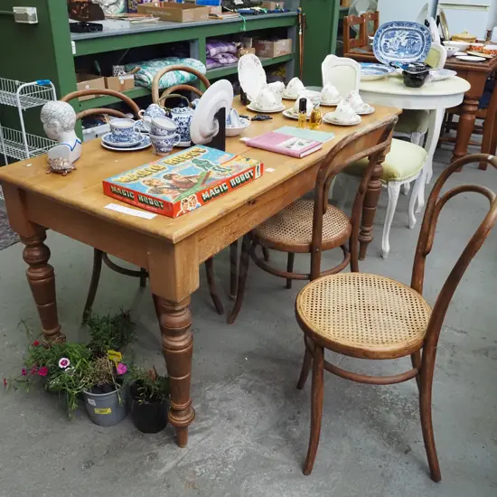solid rimu table with 4 matching bentwood and rattan chairs - table has crack