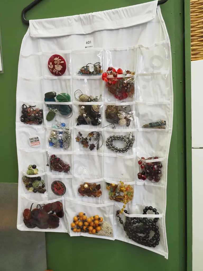 costume jewellery in coat hanger holder Image 1++