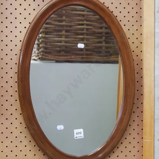wood framed oval wall mirror