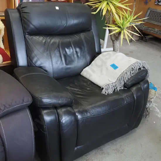 black leather reclining armchair