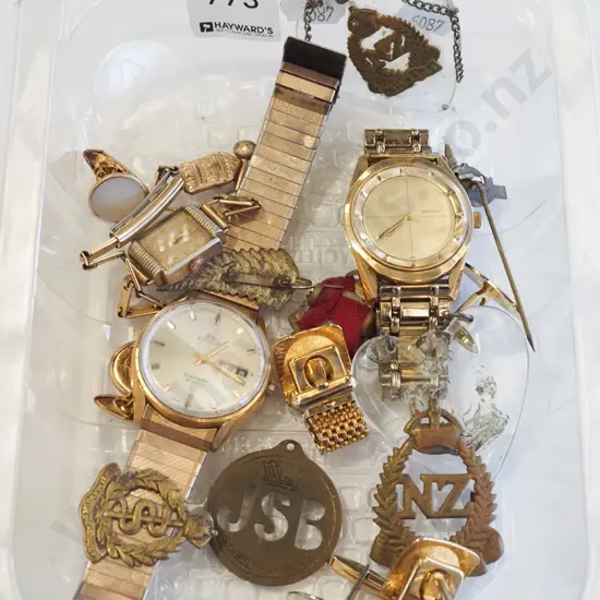 tray; watches, badges etc