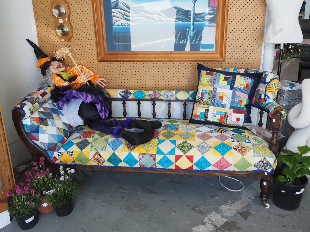 patchwork upholstered spindle back chaise longue on enamel casters with matching cushion Image 1++