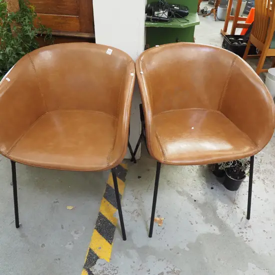 2x brown vinyl reception chairs - some wear to upholstery