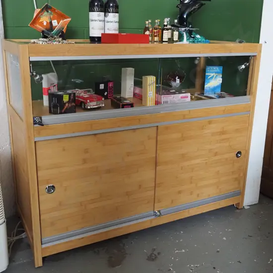 bamboo and glass illuminated display cabinet with lockable sliding doors H950 W1200 D500