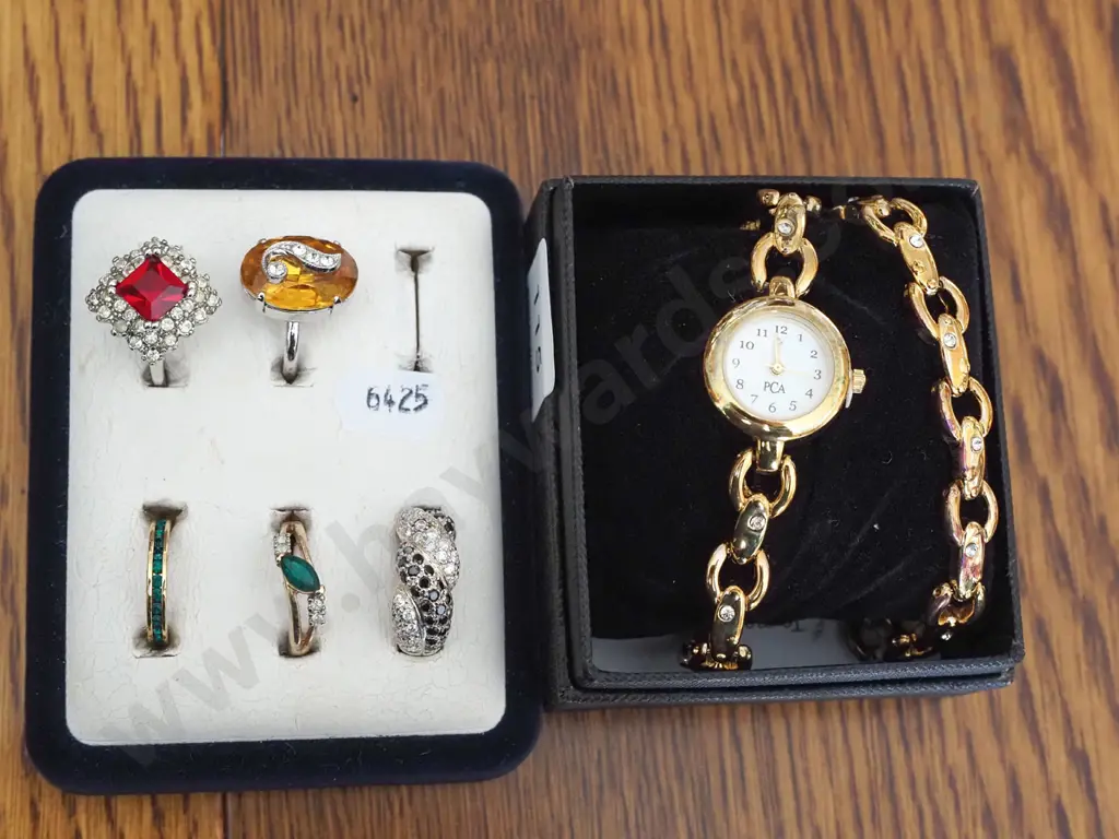 tray of costume rings, matching bracelet, watch Image 1++