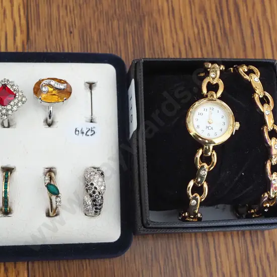 tray of costume rings, matching bracelet, watch
