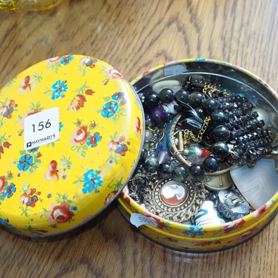 small tin and costume jewellery
