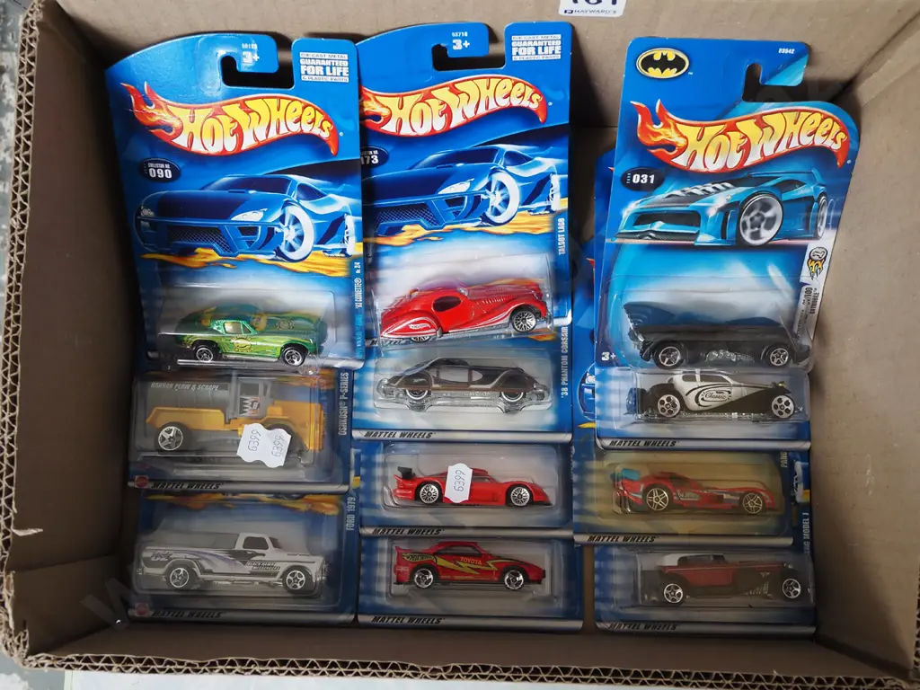 box of carded Hotwheels vehicles Image 1++