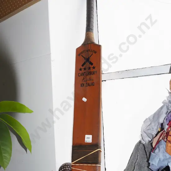 vintage cricket bat and ball