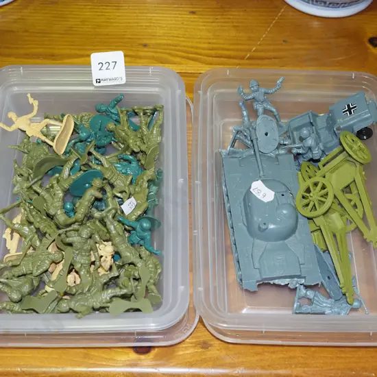 2x plastic containers of military figurines and models