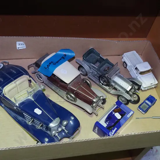 box of toy vehicles - some damage