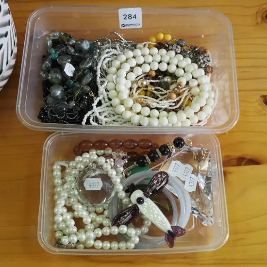 2x plastic containers of costume jewellery
