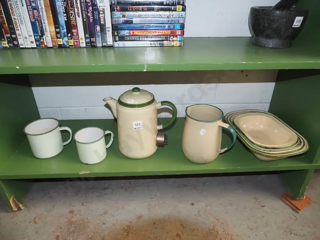 shelf of enamel ware; jugs, cups, kettle etc Image 1++