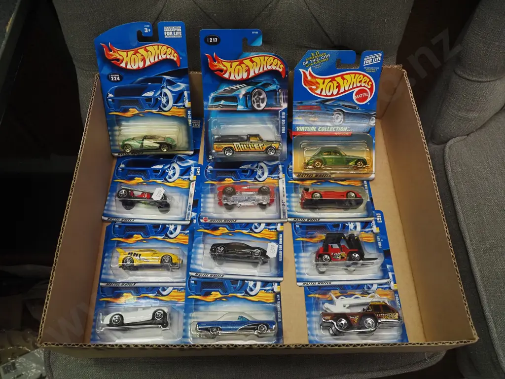 box of carded Hot Wheels die-cast vehicles Image 1++