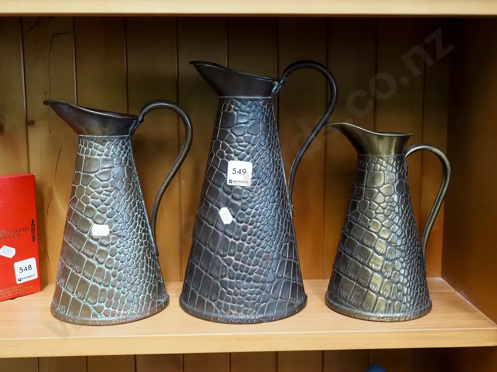 3x pressed copper and brass jugs Tallest H270 Image 1++