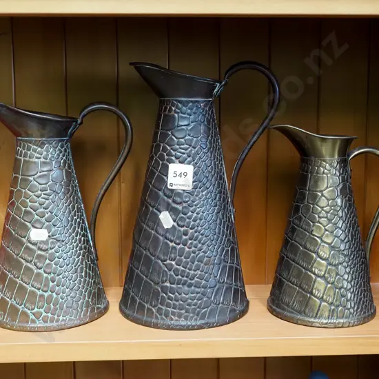 3x pressed copper and brass jugs Tallest H270