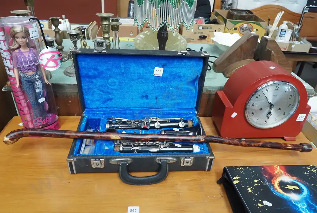 cased Swallow brand clarinet and a walking stick Image 1++