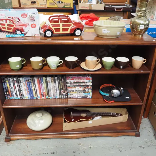 dark stained wooden bookcase H820 W1050 D230