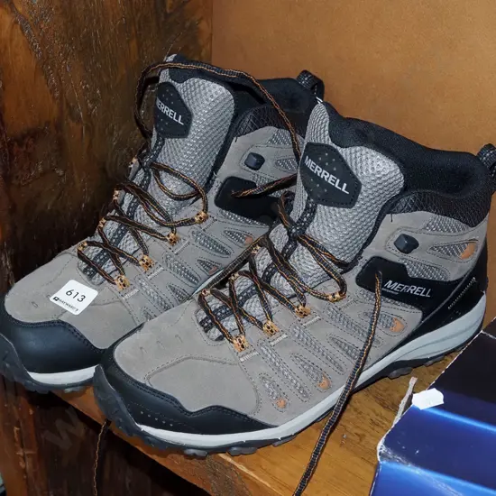 pair of Merrell USA size 11 hightop hiking boots
