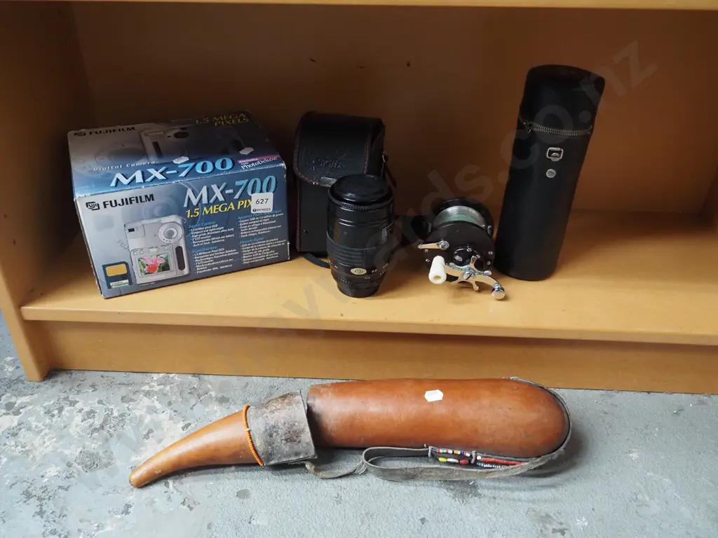 shelf; Fujifilm digital camera, fishing reel, lenses for SLR film cameras, etc. Image 1++