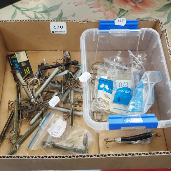 box; fishing hooks and lures