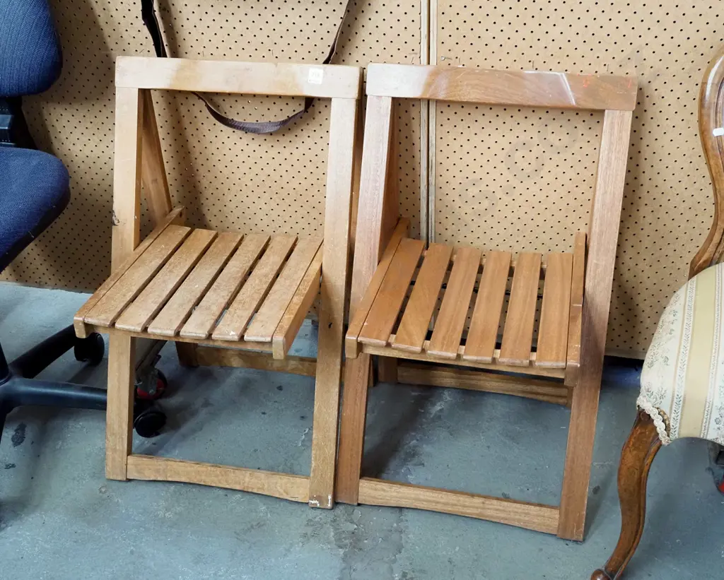 pair of hardwood outdoor folding chairs Image 1++