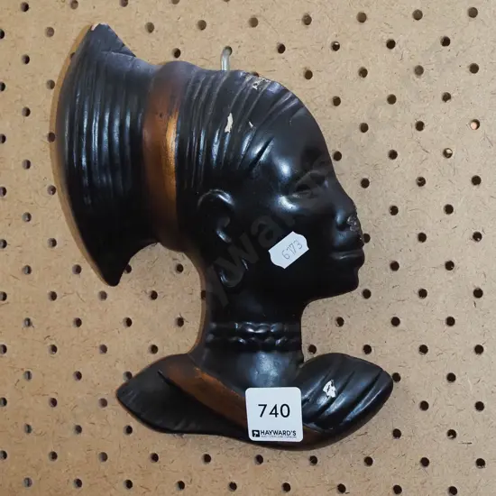 female wall silhouette - damage