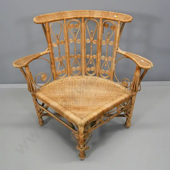 vintage cane triangular chair with woven seat - some damage to back scroll decoration H-860 W-900 D-550
