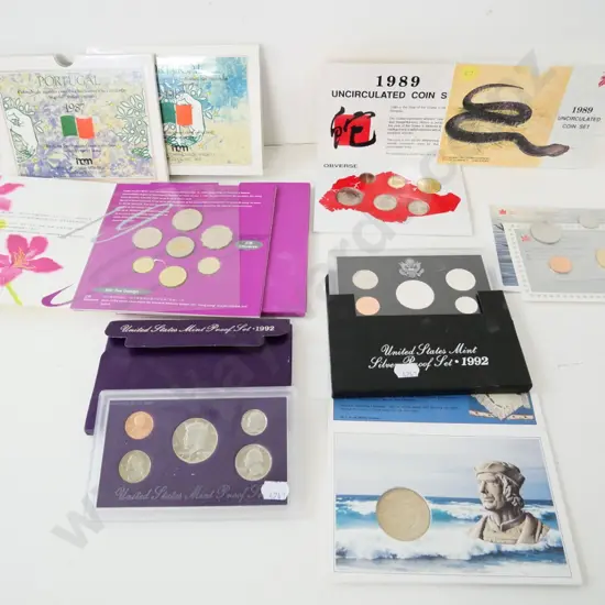 international coins: 2 USA 1992 mint proof sets, 2 Portuguese sets, Hong Kong, Canada, Singapore