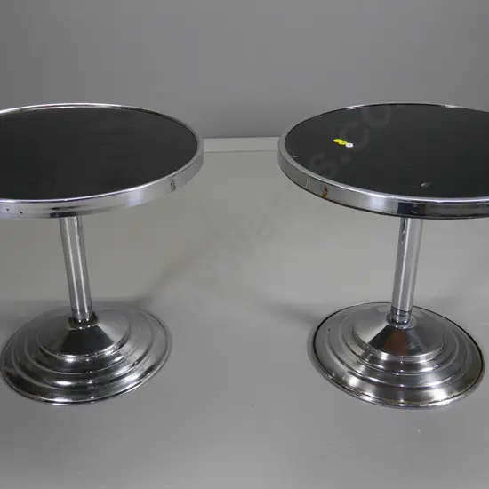 pair of retro round side tables with chrome pedestal base and black glass top - some pitting to chrome H420 Diameter 450