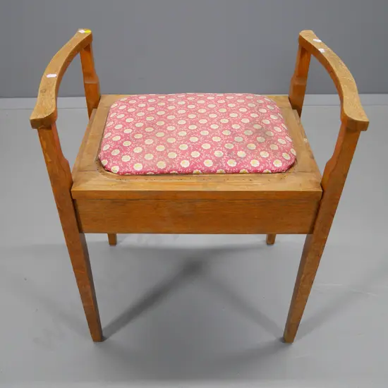 oak piano stool with lift-up seat, needs re-upholstery, comes with length of matching fabric H670 W-570 D-400