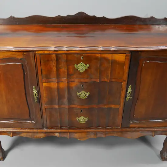 vintage mahogany sideboard w/carved decoration, claw-and-ball feet, has had repairs. missing 1 handle H960 W1370 D500