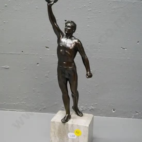 cast metal athlete figure on stone base H-310
